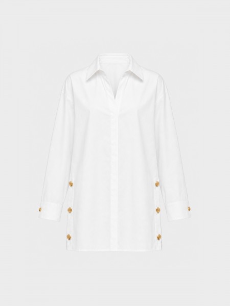 Cotton shirt with gold buttons on the side.