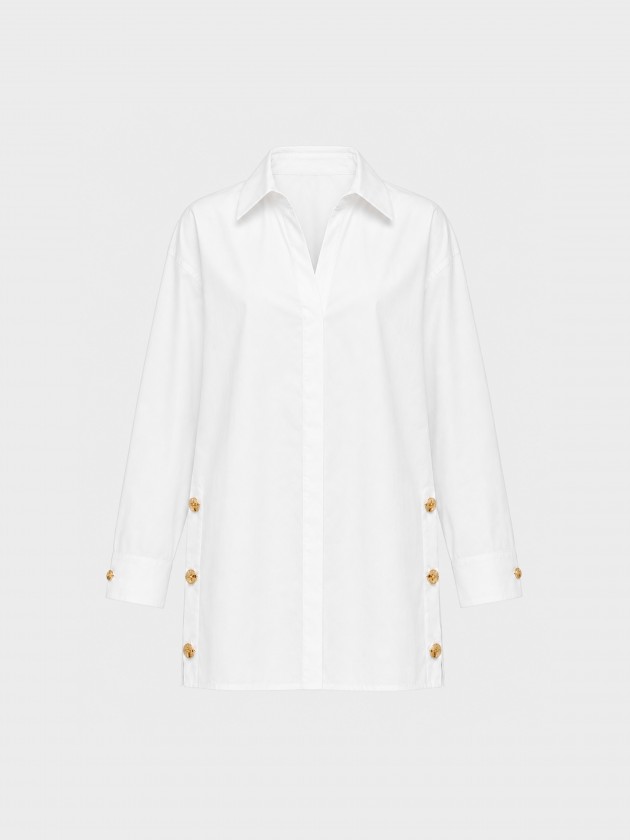 Cotton shirt with gold buttons on the side. Cotton shirt with gold buttons on the side.