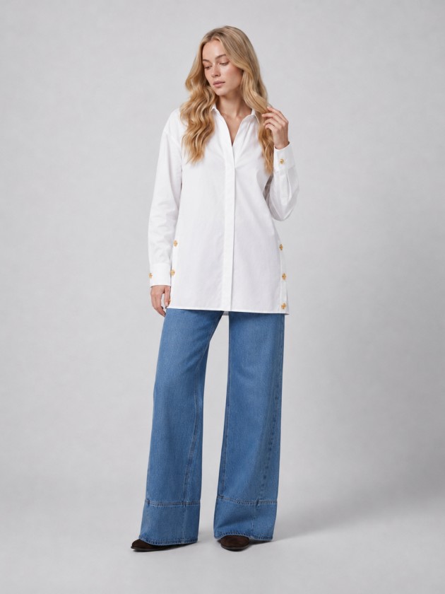 Cotton shirt with gold buttons on the side. Cotton shirt with gold buttons on the side.