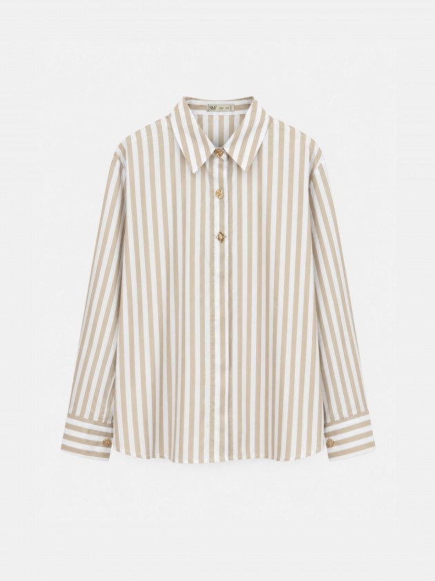 A shirt with rich, metallic buttons. A shirt with rich, metallic buttons.
