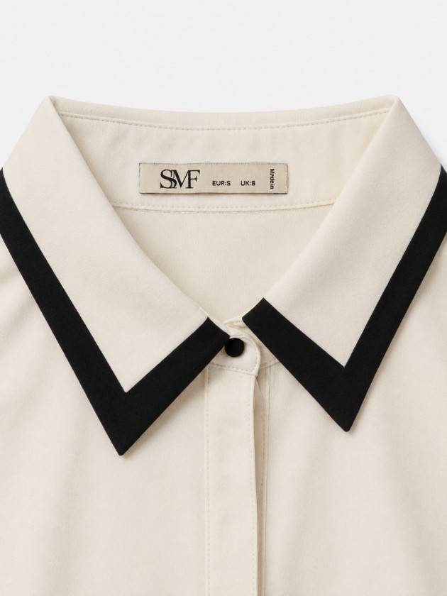 Camisa com debrum contrastante