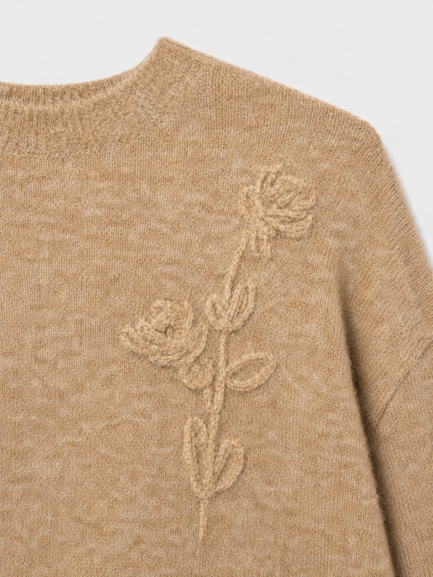 Pull tricoté à fleurs Pull tricoté à fleurs