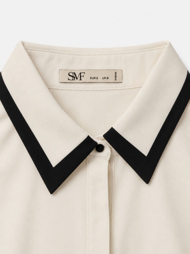 Shirt with contrasting trim.