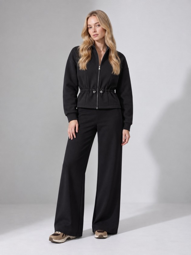 Jacket with zipper and drawstring.