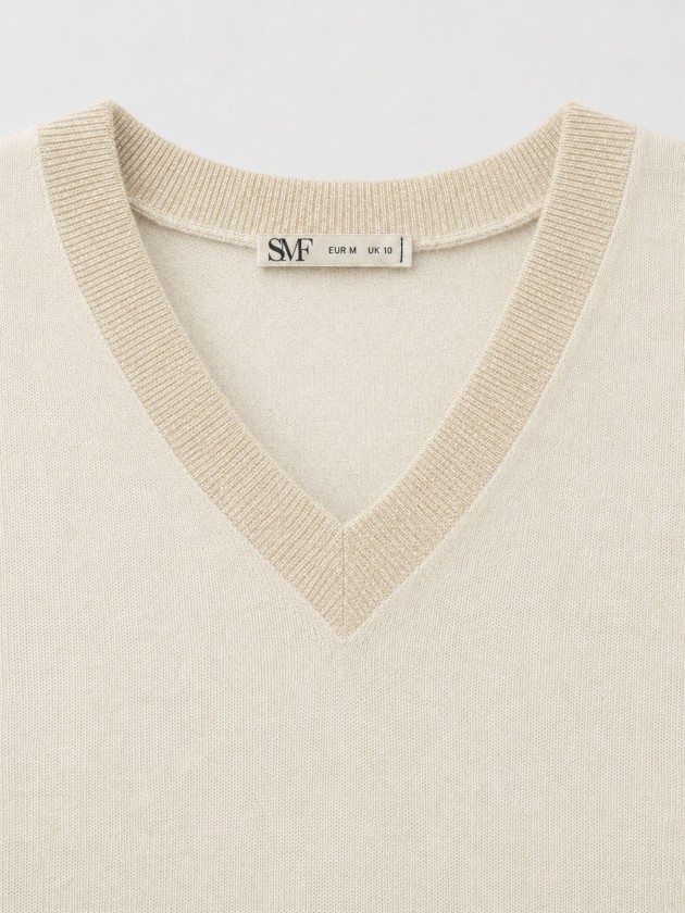 Knitted sweater with a v-neck Knitted sweater with a v-neck