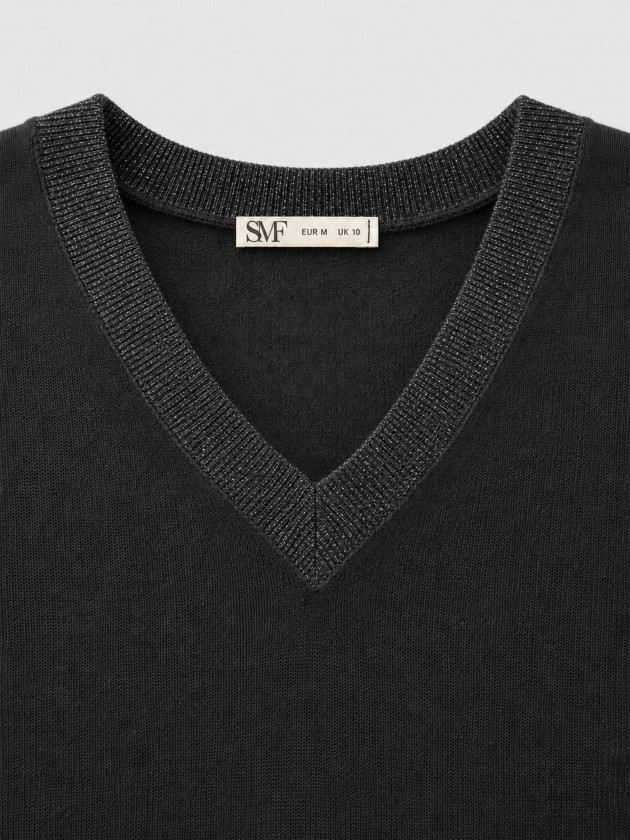 Knitted sweater with a v-neck