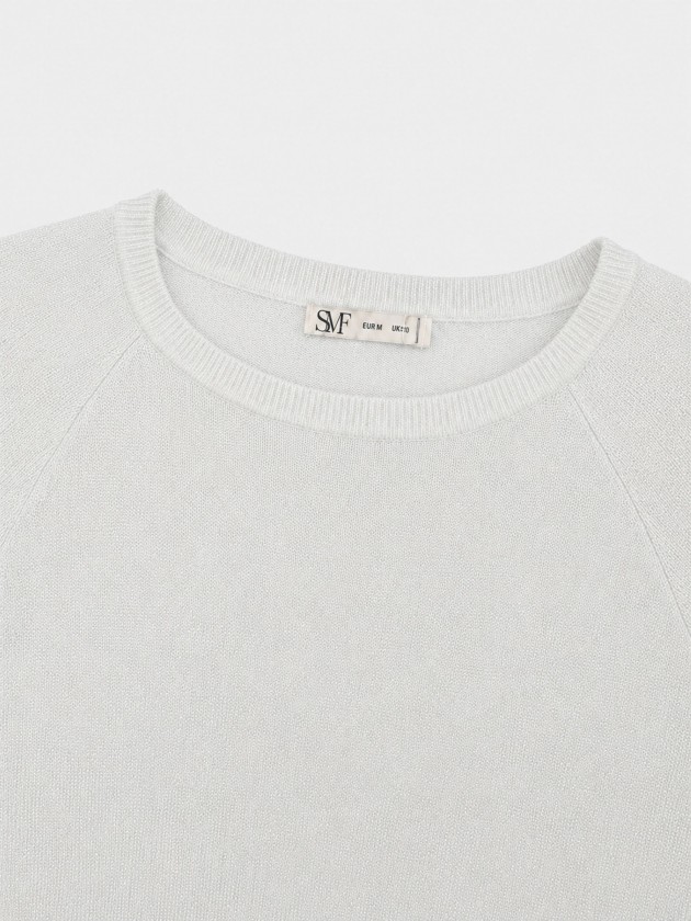 Knitted sweater with metallic thread Knitted sweater with metallic thread