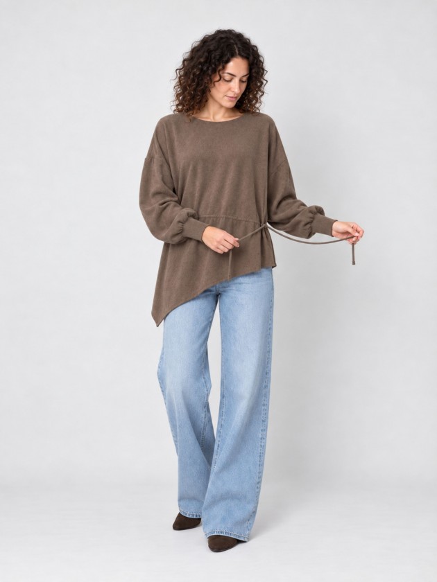 Knitted sweater with adjustable waist. Knitted sweater with adjustable waist.