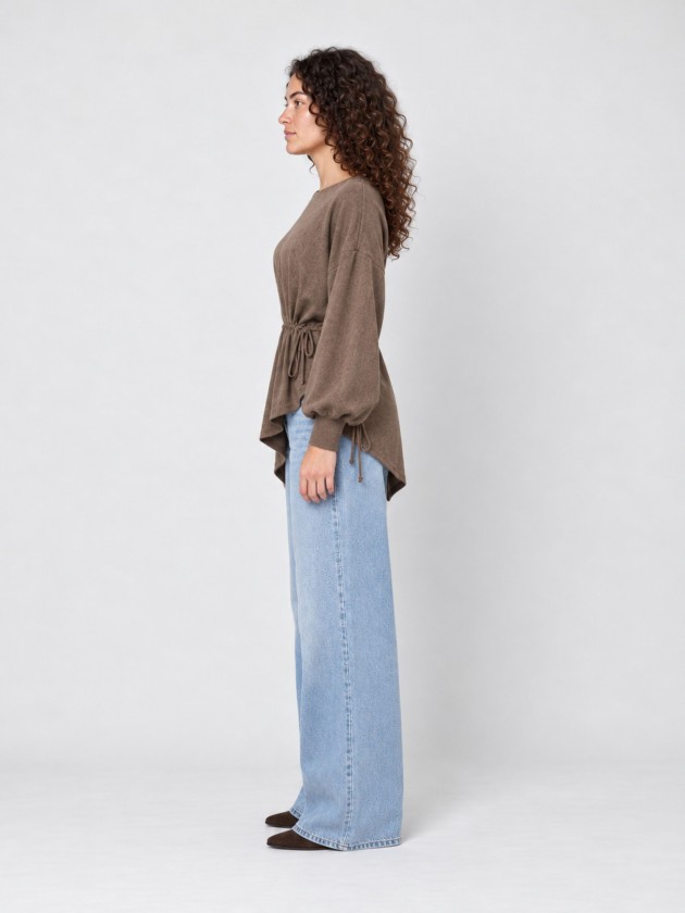 Knitted sweater with adjustable waist. Knitted sweater with adjustable waist.