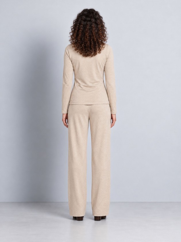 Knitted sweater with draping