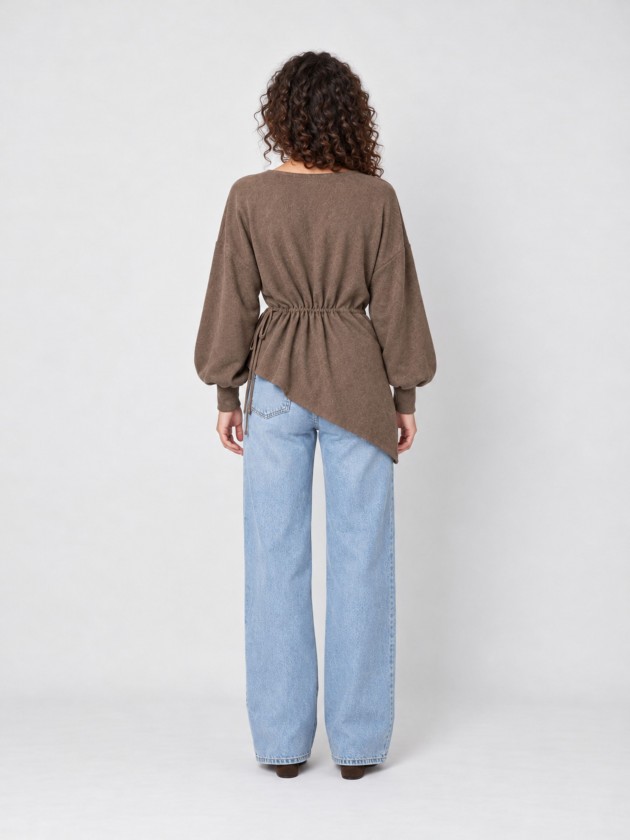 Knitted sweater with adjustable waist. Knitted sweater with adjustable waist.