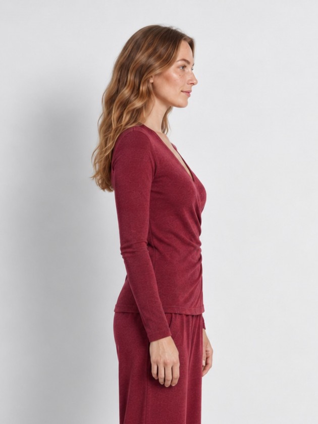 Knitted sweater with draping