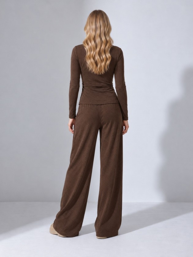 Knitted sweater with draping