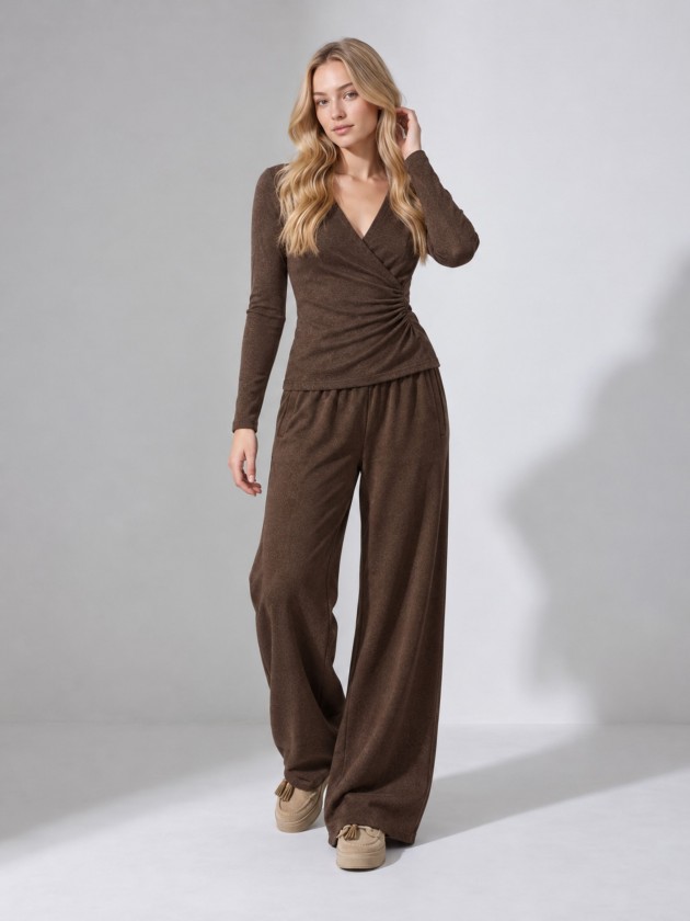 Knitted sweater with draping